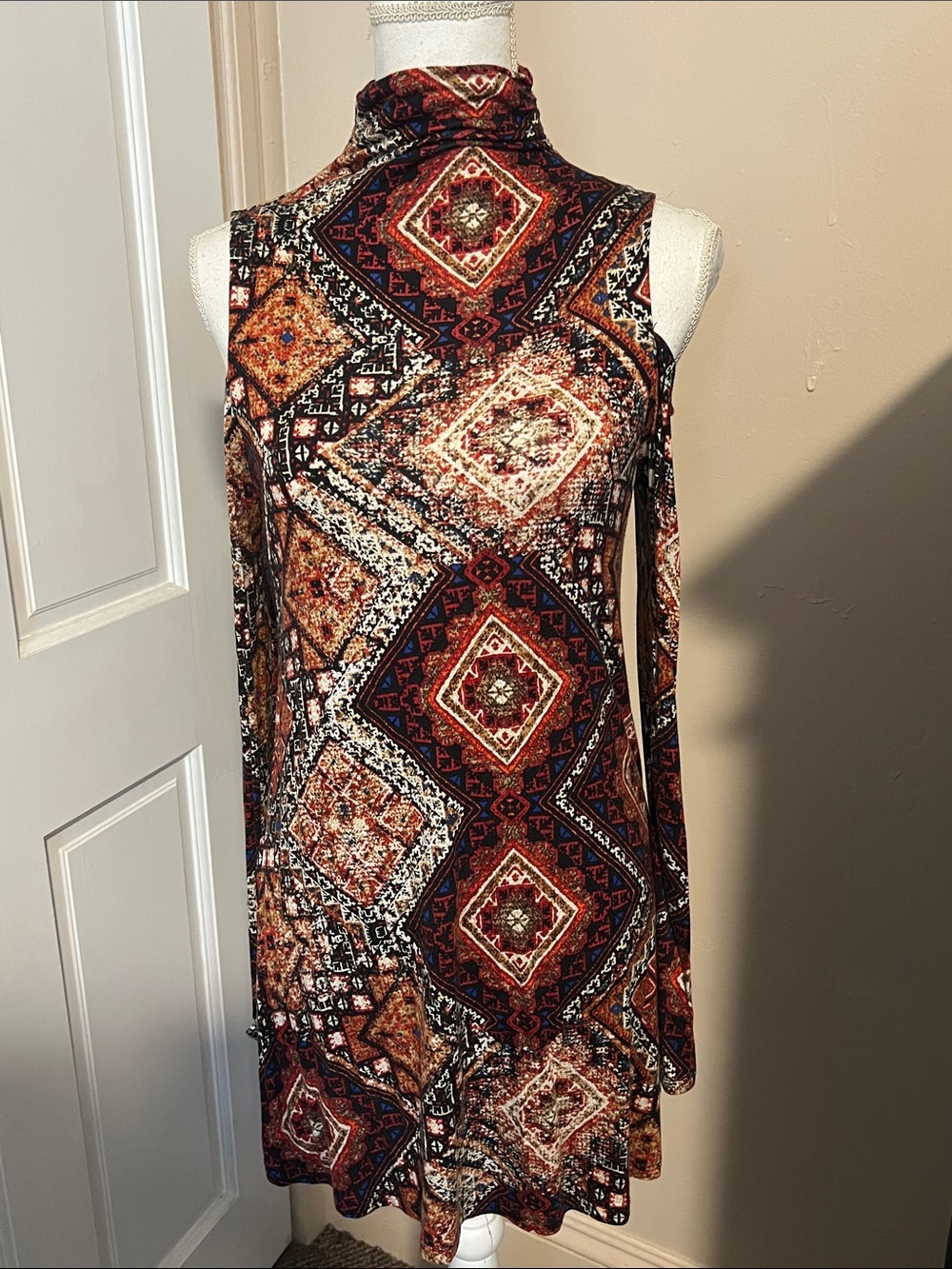 Cold Shoulder Turtleneck Dress Top in Multi-Color Geo Print
